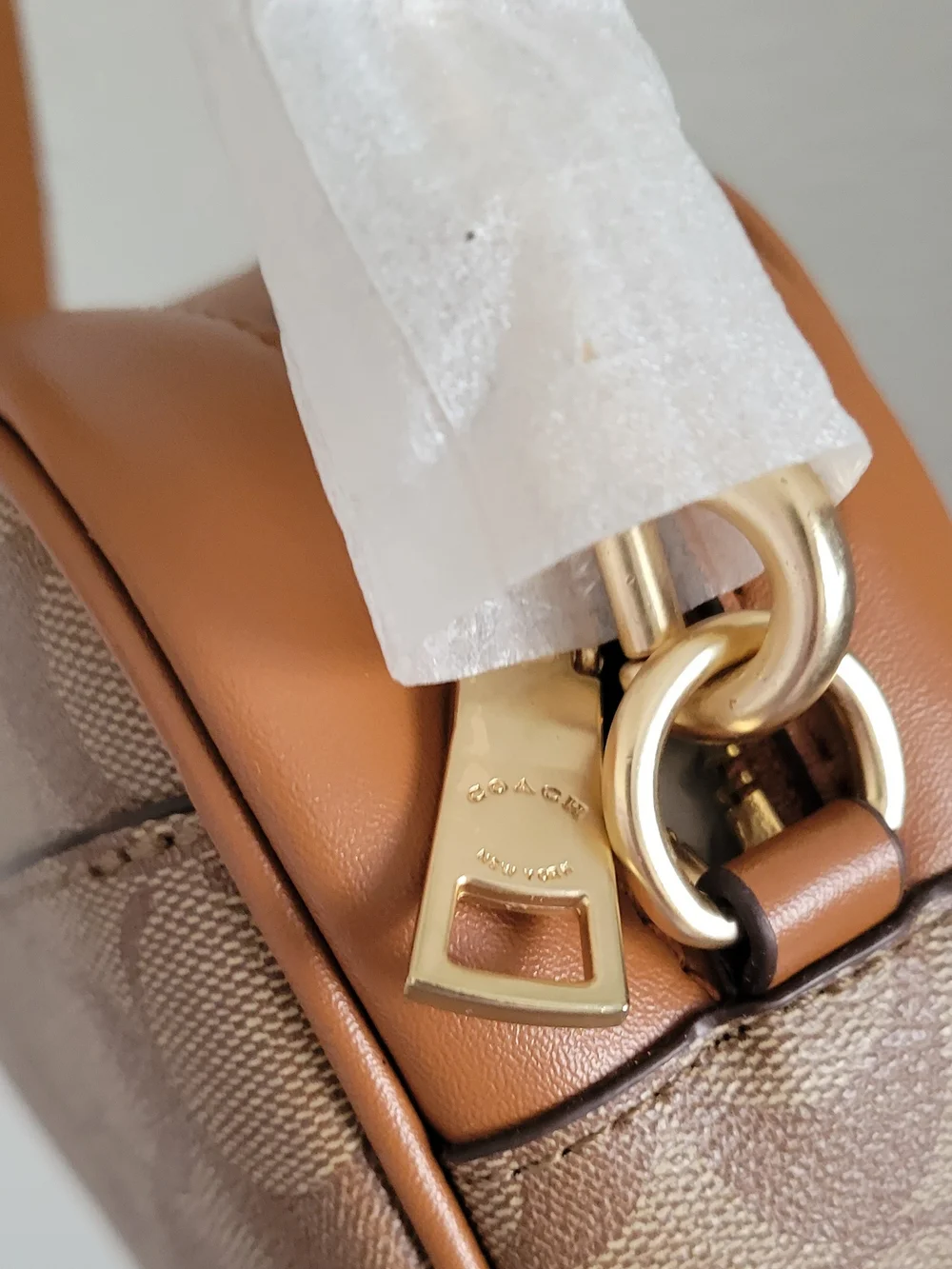 Fashion Beige Signature Canvas Crossbody with Villain Patch Accents